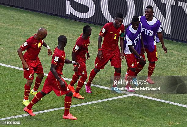 Asamoah Gyan of Ghana celebrates with his teammates scoring his team's second goal during the 2014 FIFA World Cup Brazil Group G match between...
