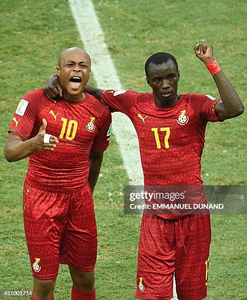 Ghana's midfielder Andre Ayew celebrates with Ghana's midfielder Mohammed Rabiu after scoring during a Group G football match between Germany and...