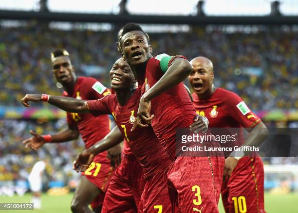 Asamoah Gyan of Ghana celebrates scoring his team's second goal during the 2014 FIFA World Cup Brazil Group G match between Germany and Ghana at...