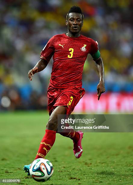 Asamoah Gyan of Ghana controls the ball during the 2014 FIFA World Cup Brazil Group G match between Germany and Ghana at Castelao on June 21, 2014 in...