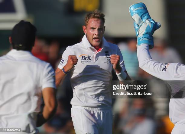 Stuart Broad of England celebrates after taking his fifth wicket after dismissing Mitchell Johnson of Australia during day one of the First Ashes...