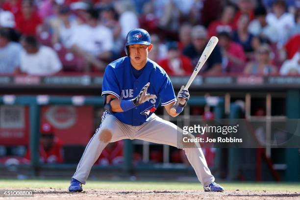 Munenori Kawasaki of the Toronto Blue Jays takes a pitch while batting during the game against the Cincinnati Reds at Great American Ball Park on...
