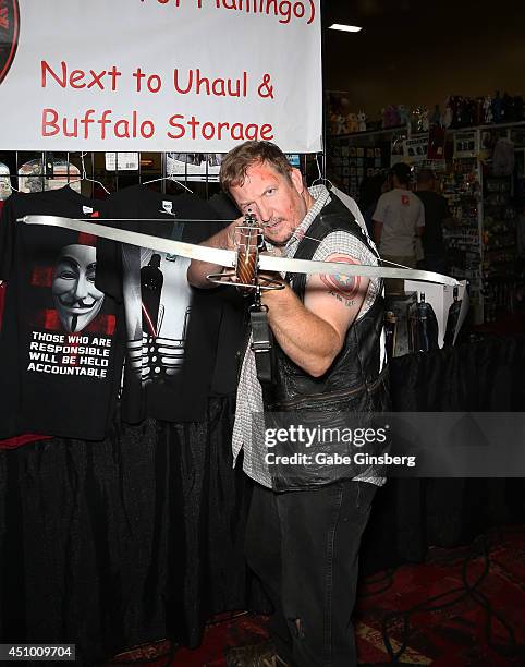 Chanon Allen dressed as Daryl Dixon from "The Walking Dead" television franchise attends the Amazing Las Vegas Comic Con at the South Point Hotel &...