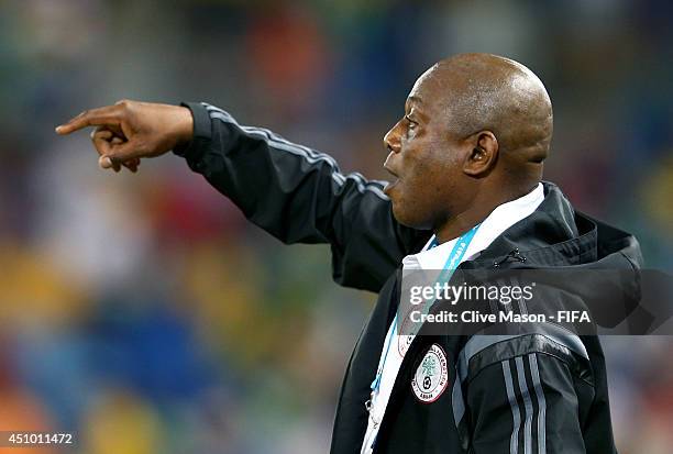 Head coach Stephen Keshi of Nigeria gestures during the 2014 FIFA World Cup Brazil Group F match between Nigeria and Bosnia-Herzegovina at Arena...