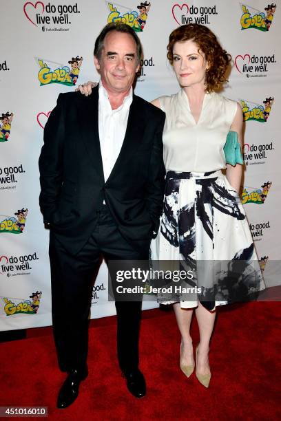 Tom Irwin and Rebecca Wisocky arrive at the premiere of 'LA GOLDA' at The Crest on June 21, 2014 in Los Angeles, California.