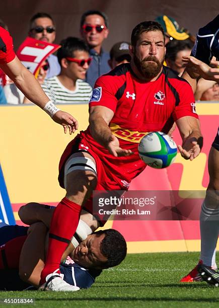 Jamie Cudmore of Canada passes the ball during Pacific Nations Cup Rugby action against Japan on June 7, 2014 at Swanguard Stadium in Burnaby,...