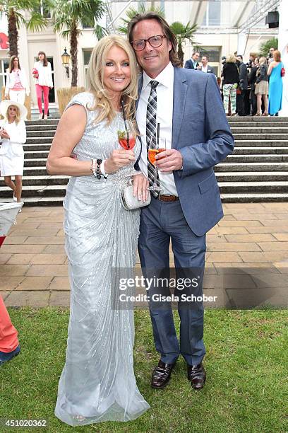 Frauke Ludowig and her husband Kai Roeffen attend the Raffaello Summer Day 2014 at Kronprinzenpalais on June 21, 2014 in Berlin, Germany.