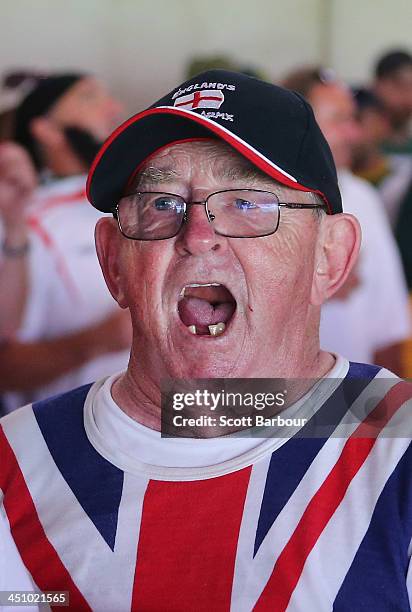 Barmy Army member sings during day one of the First Ashes Test match between Australia and England at The Gabba on November 21, 2013 in Brisbane,...