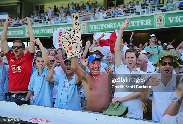 Barmy Army members celebrate after a wicket during day one of the First Ashes Test match between Australia and England at The Gabba on November 21,...