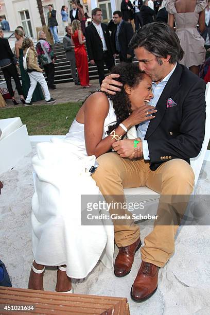 Milka Loff Fernandes and her husband Robert Irschara attend the Raffaello Summer Day 2014 at Kronprinzenpalais on June 21, 2014 in Berlin, Germany.