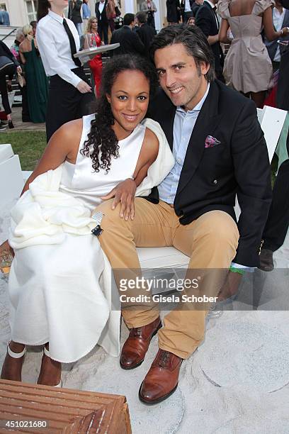 Milka Loff Fernandes and her husband Robert Irschara attend the Raffaello Summer Day 2014 at Kronprinzenpalais on June 21, 2014 in Berlin, Germany.