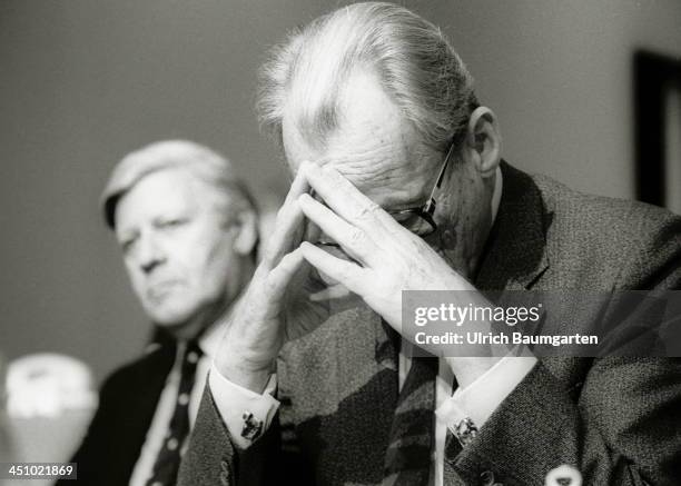 Willy Brandt and Helmut Schmidt during the SPD party convention on November 18, 1983 in Cologne, Germany.