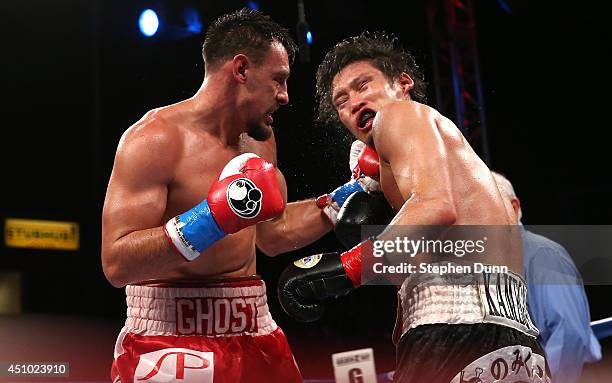 Robert Guerrero lands a punch on Yoshihiro Kamegai in their welterweight bout at StubHub Center on June 21, 2014 in Los Angeles, California. Guerrero...