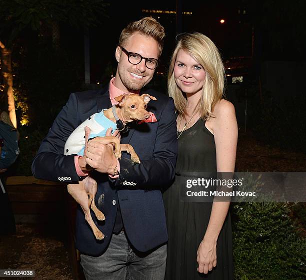 Photographer Seth Casteel , Courtney Dasher, and dog Tuna enjoy the "More Than a Cone" art auction and campaign launch benefiting Best Friends Animal...