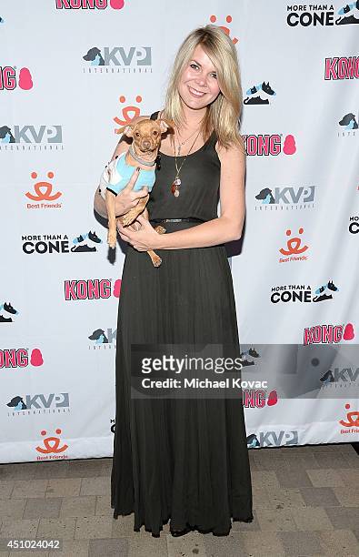 Courtney Dasher with her dog Tuna enjoys the "More Than a Cone" art auction and campaign launch benefiting Best Friends Animal Society in Los Angeles...