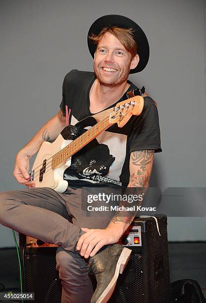 Musician Robbie G of musical group 'Deluka' performs onstage at the "More Than a Cone" art auction and campaign launch benefiting Best Friends Animal...