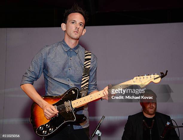 Musician Kris Kovacs of musical group 'Deluka' performs onstage at the "More Than a Cone" art auction and campaign launch benefiting Best Friends...