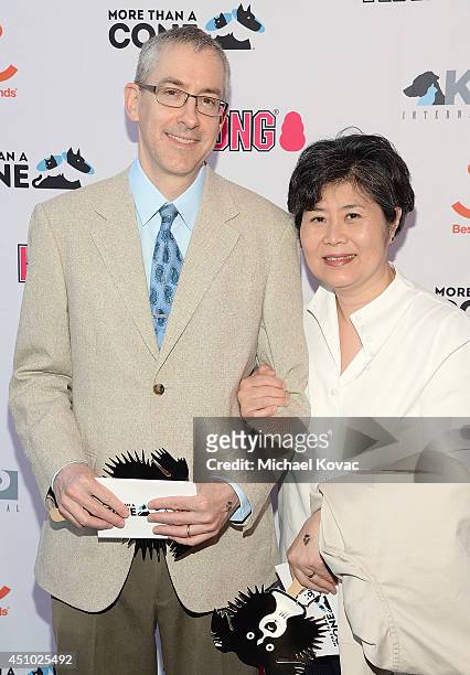 Artists Andrew S. Conklin and Helen Oh enjoy the "More Than a Cone" art auction and campaign launch benefiting Best Friends Animal Society in Los...