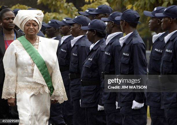 Liberian President Ellen Johnson-Sirleaf inspects members of the Liberian Police after the Inauguration Ceremony at the Capitol Building in Monrovia,...