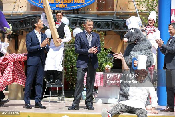 Eurodisney president Philippe Gas and chairman of the Walt Disney Company Robert A Iger and chairman of Walt Disney Parks and Resorts Tom Staggs...