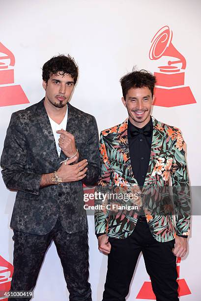 Singers Dante Spinetta and Emmanuel Horvilleur of Illya Kuryaki and the Valderrama arrive at the 2013 Latin Recording Academy Person Of The Year...