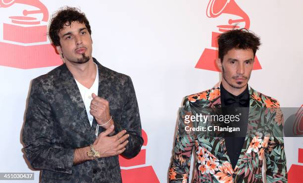 Singers Dante Spinetta and Emmanuel Horvilleur of Illya Kuryaki and the Valderrama arrive at the 2013 Latin Recording Academy Person Of The Year...