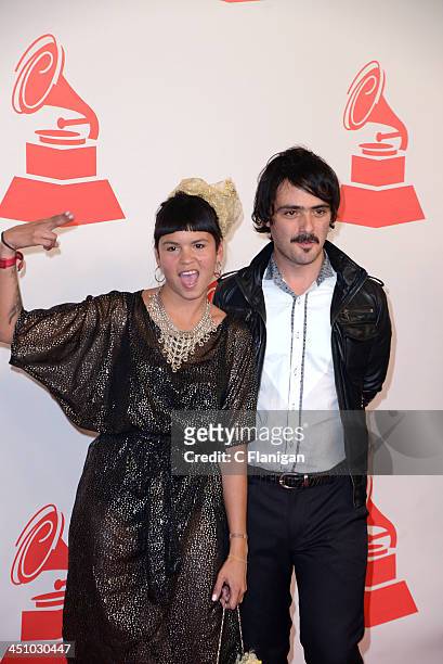 Singers Liliana Saumet and Simon Mejia of Bomba Estereo arrive at the 2013 Latin Recording Academy Person Of The Year Tribute Honoring Miguel Bose at...