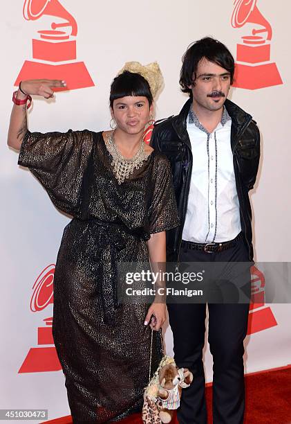 Singers Liliana Saumet and Simon Mejia of Bomba Estereo arrive at the 2013 Latin Recording Academy Person Of The Year Tribute Honoring Miguel Bose at...