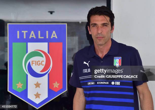 Italy's goalkeeper and captain Gianluigi Buffon poses for a photo before a press conference at the Abc Frasqueiro Stadium in Natal on June 22 during...