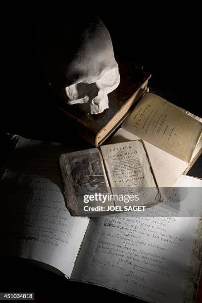 This picture taken on May 21, 2014 in Boulogne-Billancourt, outside Paris, shows a moulding of the skull of French writer the Marquis de Sade, made...