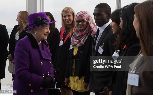 Queen Elizabeth II during her visit to The Shard on November 21, 2013 in London, England. Queen Elizabeth II met young people from the local area and...