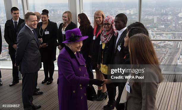 Queen Elizabeth II during her visit to The Shard on November 21, 2013 in London, England. Queen Elizabeth II met young people from the local area and...