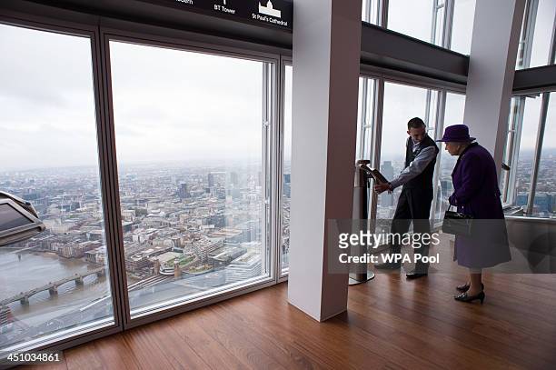 Queen Elizabeth II during her visit to The Shard on November 21, 2013 in London, England. Queen Elizabeth II met young people from the local area and...