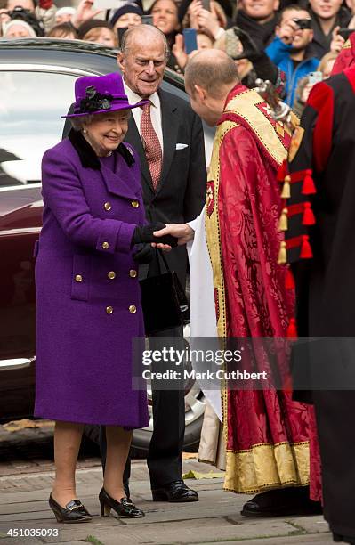 Queen Elizabeth II and Prince Philip, Duke of Edinburgh visit Southwark Cathedral on November 21, 2013 in London, England.