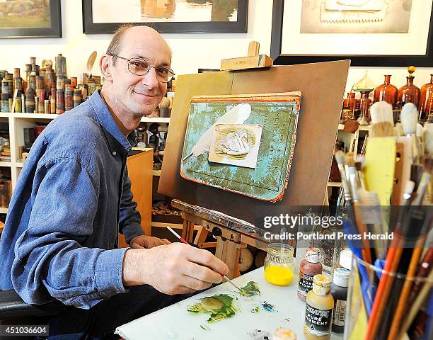 John Whalley, a Nobleboro artist, works on his latest egg tempera on panel painting named "Swan Lake."