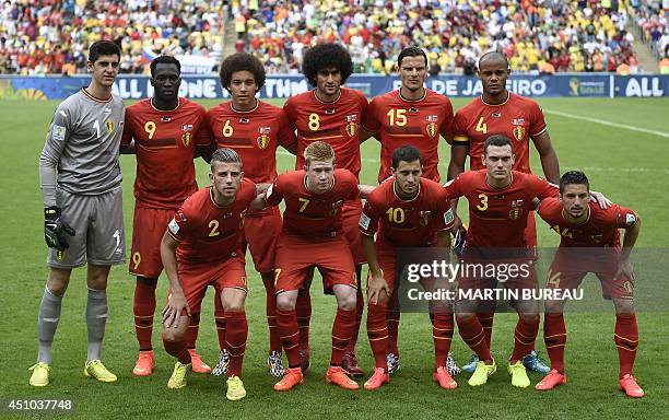 Belgium's footballers pose for pictures before the Group H football match between Belgium and Russia at the Maracana Stadium in Rio de Janeiro during...