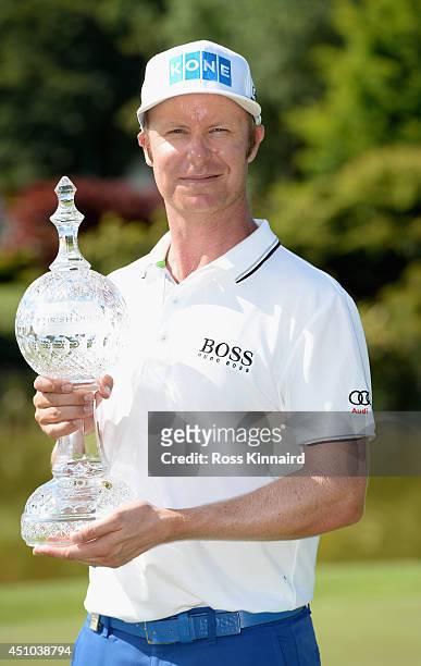 Mikko Ilonen of Finland celebrates with the winners trophy after the final round of the Irish Open at the Fota Island Resort on June 22, 2014 in...