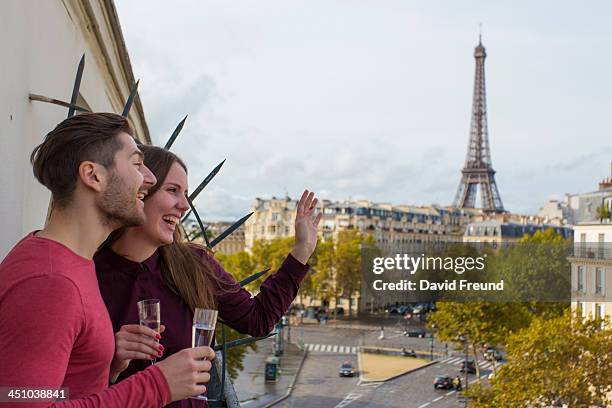 eiffel tower balcony champagne - champagne tower stock pictures, royalty-free photos & images