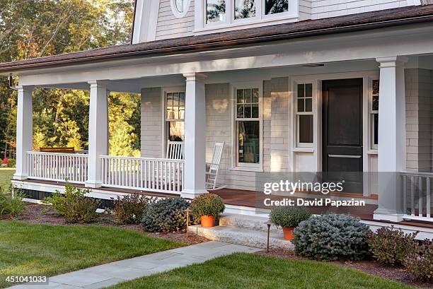 new home porch exterior with front door - veranda stock pictures, royalty-free photos & images