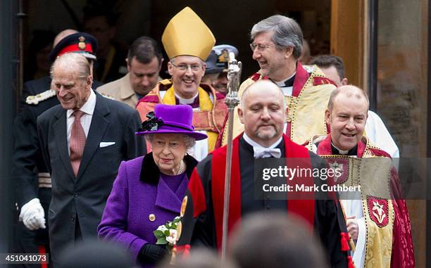 Queen Elizabeth II and Prince Philip, Duke of Edinburgh visit Southwark Cathedral on November 21, 2013 in London, England.