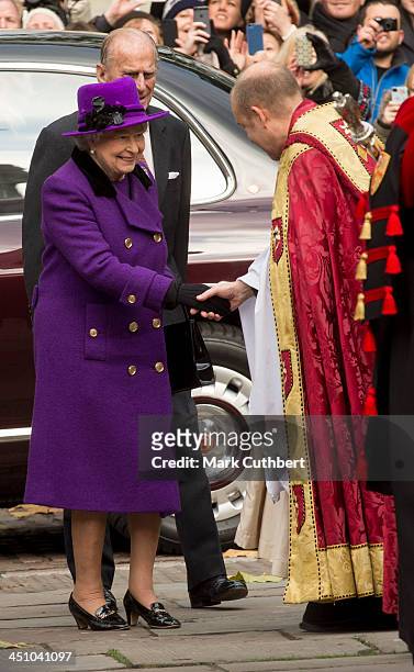 Queen Elizabeth II and Prince Philip, Duke of Edinburgh visit Southwark Cathedral on November 21, 2013 in London, England.