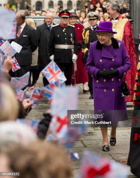 Queen Elizabeth II and Prince Philip, Duke of Edinburgh visit Southwark Cathedral on November 21, 2013 in London, England.