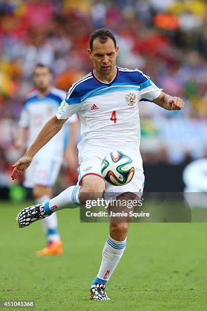 Sergey Ignashevich of Russia controls the ball during the 2014 FIFA World Cup Brazil Group H match between Belgium and Russia at Maracana on June 22,...