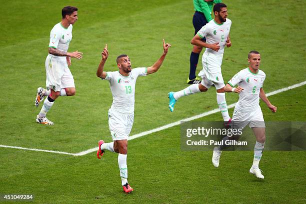 Islam Slimani of Algeria celebrates scoring his team's first goal during the 2014 FIFA World Cup Brazil Group H match between South Korea and Algeria...