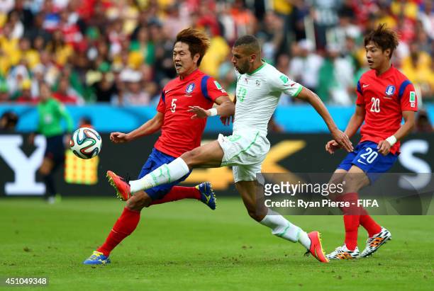 Islam Slimani of Algeria scores his team's first goal during the 2014 FIFA World Cup Brazil Group H match between Korea Republic and Algeria at...