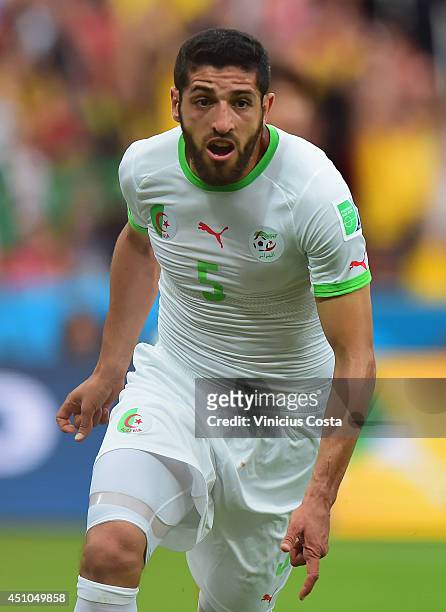 Rafik Halliche of Algeria celebrates after scoring his team's second goal during the 2014 FIFA World Cup Brazil Group H match between South Korea and...