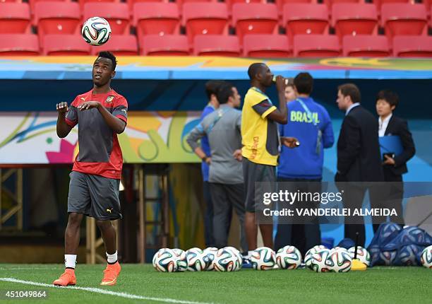 Cameroon's forward Fabrice Olinga takes part in a training session at the Estadio Nacional Stadium in Brasilia, on June 22 on the eve of the 2014...