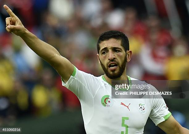 Algeria's defender Rafik Halliche celebrates after scoring his team's second goal during the Group H football match between South Korea and Algeria...