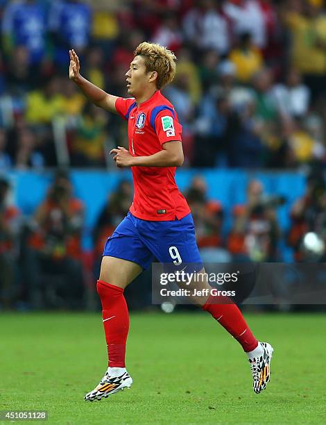 Son Heung-Min of South Korea celebrates after scoring his team's firsrt goal during the 2014 FIFA World Cup Brazil Group H match between South Korea...