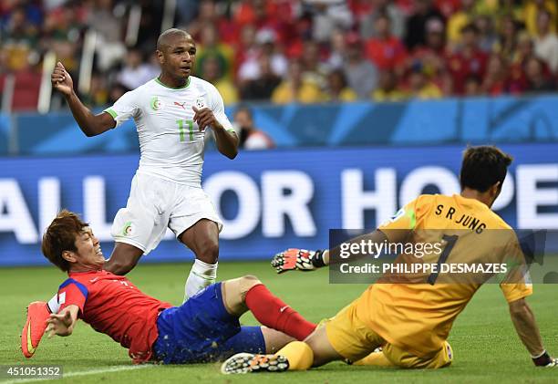 Algeria's midfielder Yacine Brahimi reacts as he scores his team's fourth goal during the Group H football match between South Korea and Algeria at...